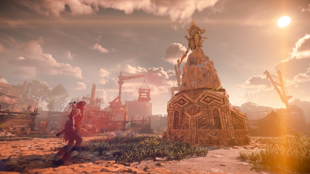 Aloy frente a la estatua de la redentora de Meridian.